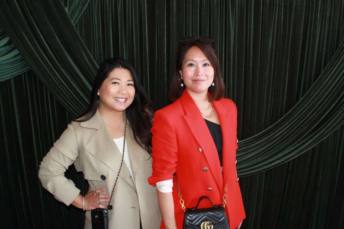 Guests enjoying a photo booth at a corporate event